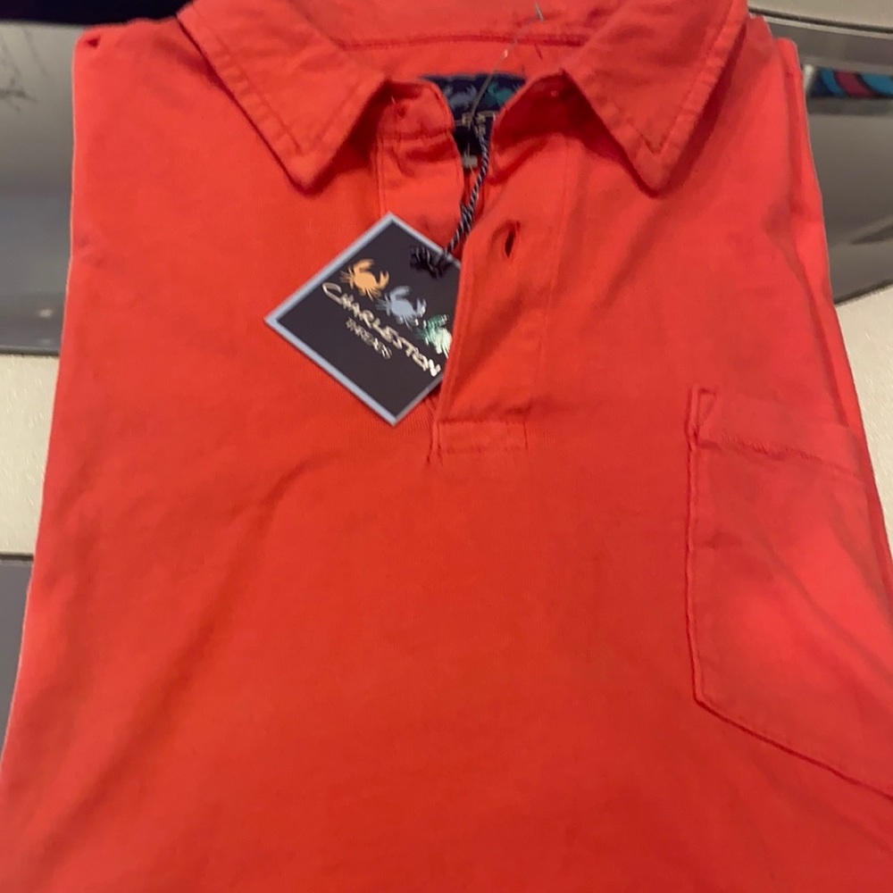 Beautiful salmon Charleston threads polo 🔥🔥🔥